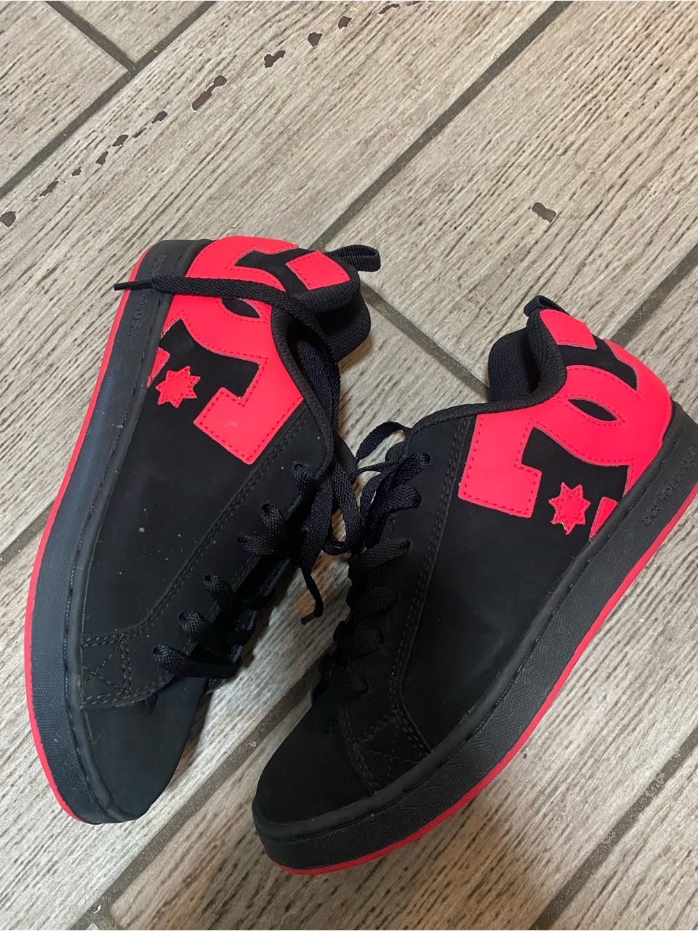 DC Black Sneakers with Red Logo Accents